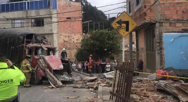 Los dos ancianos que  un camión mató al estrellarse con su  vivienda en Bogotá