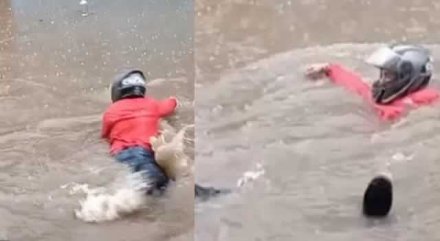 ´¿Para qué playa? ´: Hombre aprovechó las lluvias para nadar en Bogotá