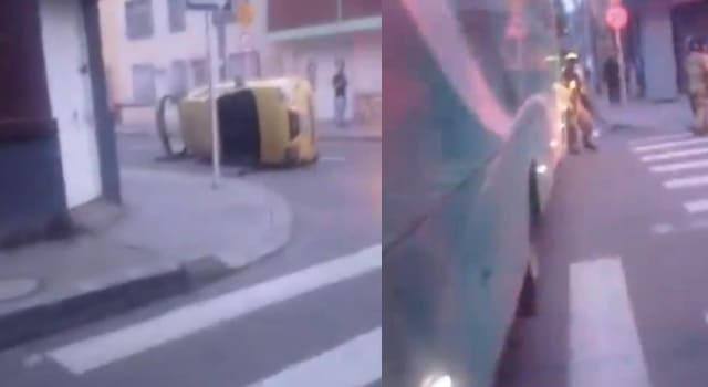 Taxi volcado luego de ser impactado por un bus que omitió una señal de tránsito